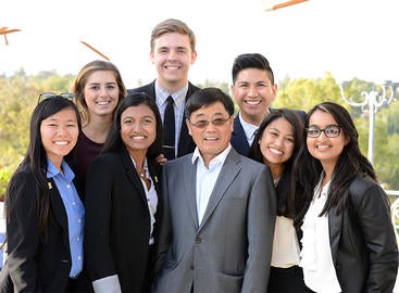 UCR School of Business - Dean Yunzeng Wang with Students