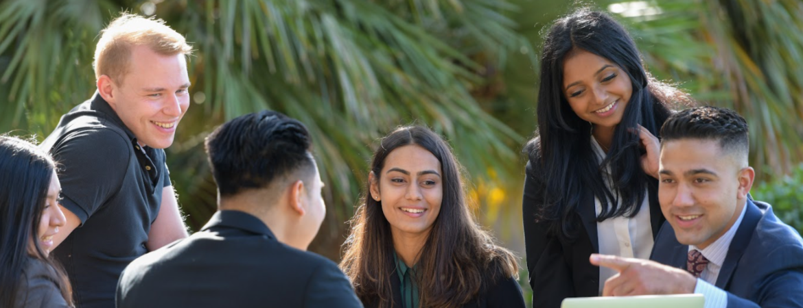 Grad students at Anderson Hall, UCR School of Business