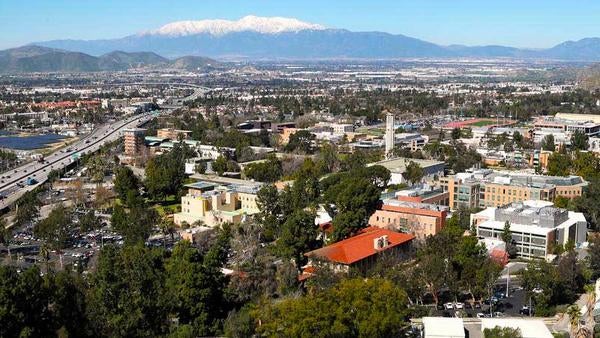 UCR campus aerial view with snow capped mountains