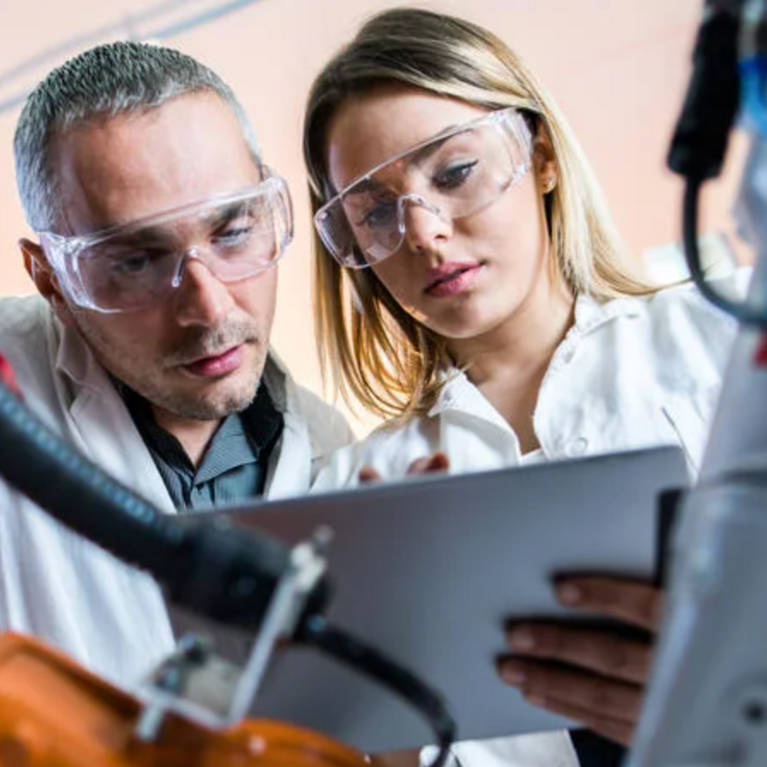 Female and male scientists in a lab