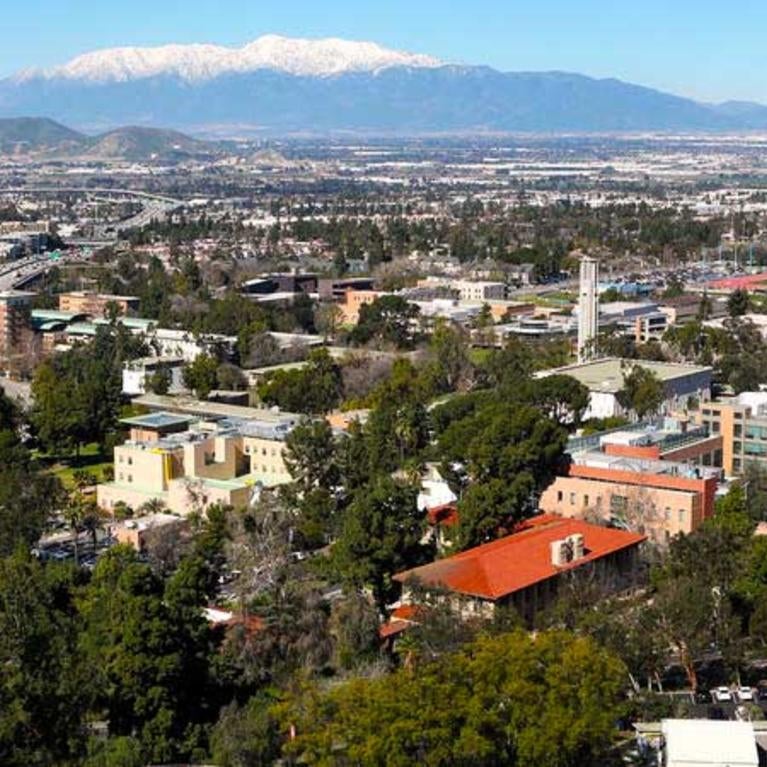 UCR campus aerial view with snow capped mountains