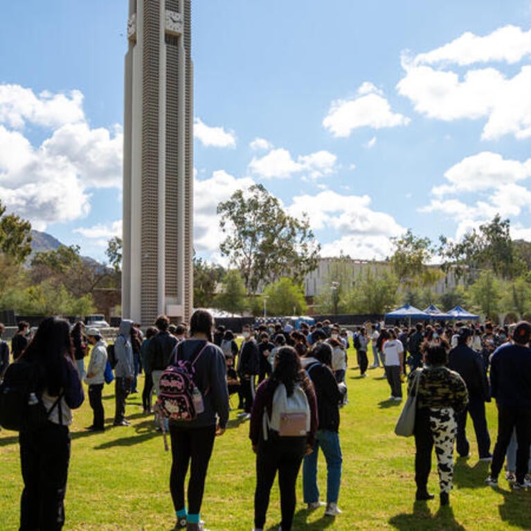 Campus with students and bell tower