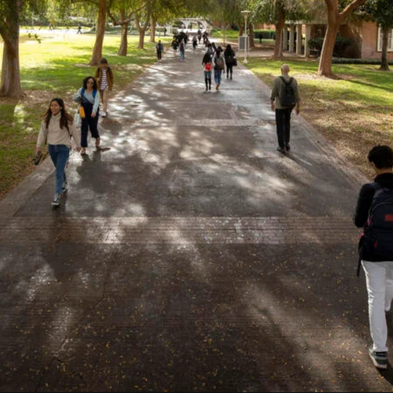 Students walking on campus at UC Riverside