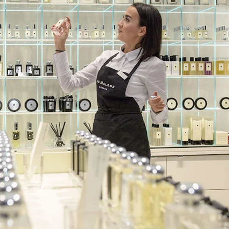 A saleswoman at a  'Jo Malone'  luxury fragrances counter in Duesseldorf, Germany