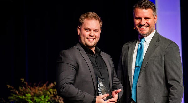 Valtteri Salomaki ’18, ’20 MBA receiving an award, City of Riverside
