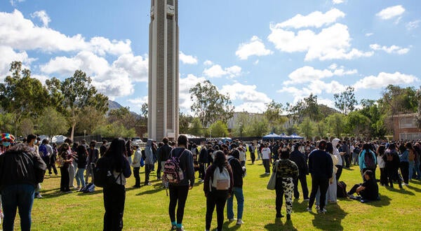 Campus with students and bell tower