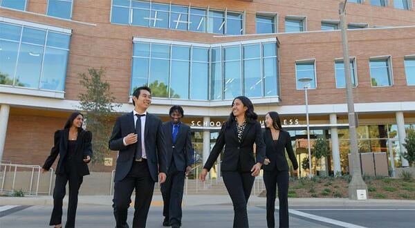 Diverse students in front of new Business Building