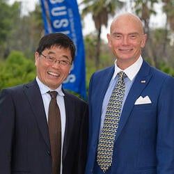 Dean Wang and Tim Greenleaf '78, Executive Fellow 2014-2015 and installation dinner emcee