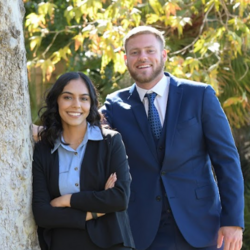 Two School of UCR Business students 
