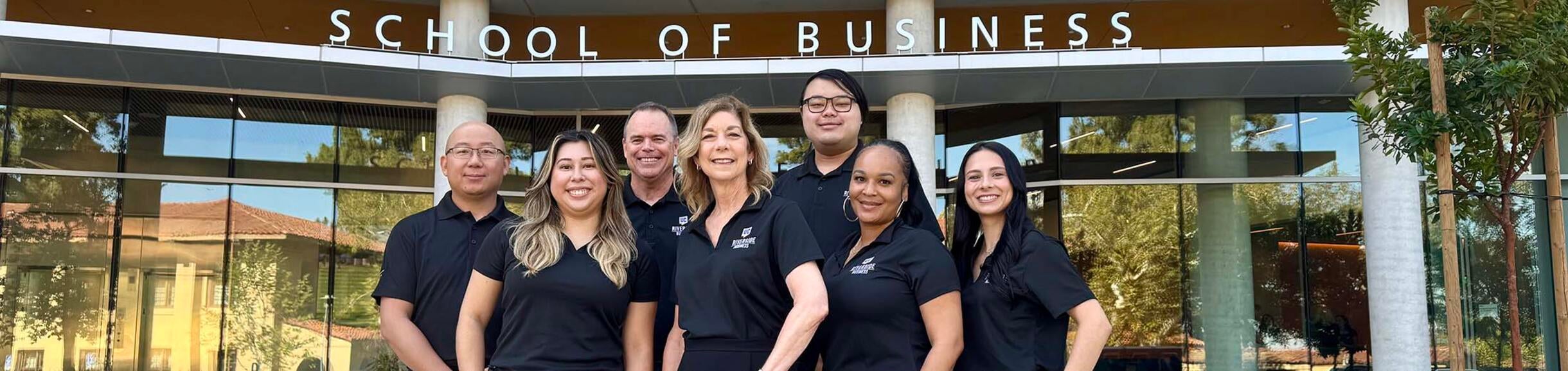 Graduate Student Success Team in front of the UCR School of Business building