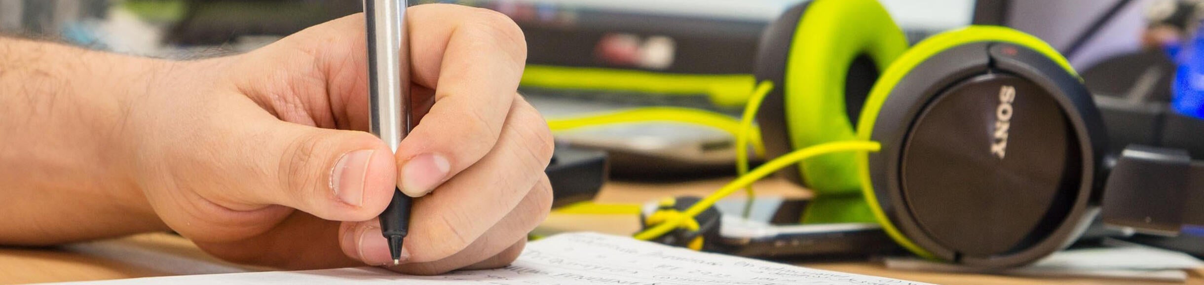 Student working on a notepad