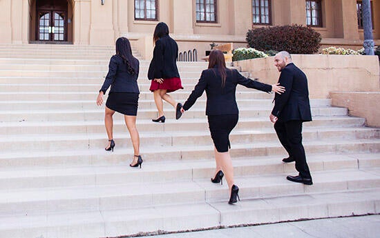 UCR Business Students Walking Up Anderson Steps