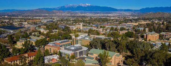 UC Riverside campus aerial view with snow capped mountains | School of ...