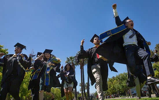 UCR Graduates Jumping