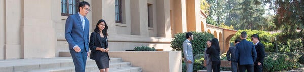 UCR School of Business - graduate students in front of Anderson Hall