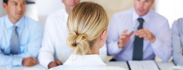 Women and men in business meeting