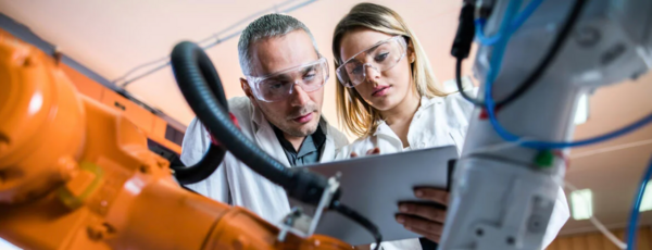 Female and male scientists in a lab