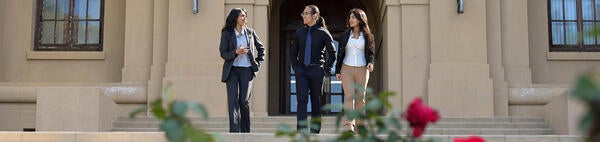 Business undergrad students on Anderson Hall stairs