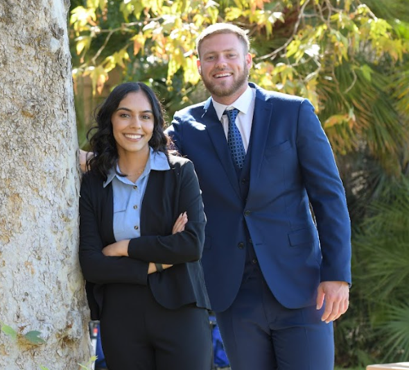 Two School of UCR Business students 