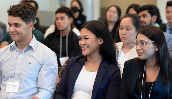 3 students at orientation