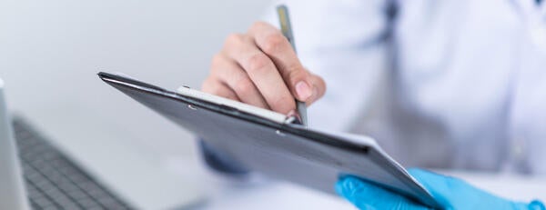 Health worker holding tablet