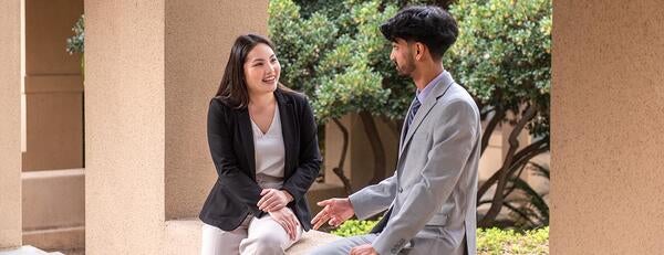 Prof. Mindy Truong with a student