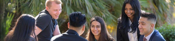 Students at table outdoors