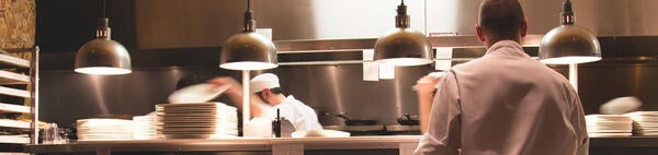 Cooks in restaurant kitchen