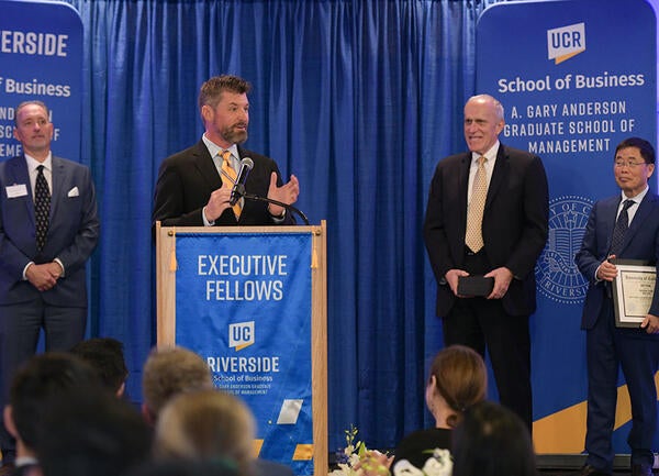 Executive Fellows Installation Dinner 2024, On stage with Jeff Paul