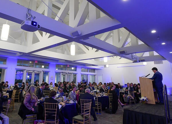 Executive Fellows Installation Dinner 2024, Dean on Stage Speaking