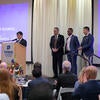 Dean Yunzeng Wang introducing the new Executive Fellows James Merino, Damon Richardson, and Michael Xu