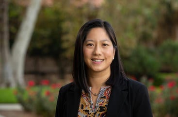 Poets & Quants article, professor Elaine Wong