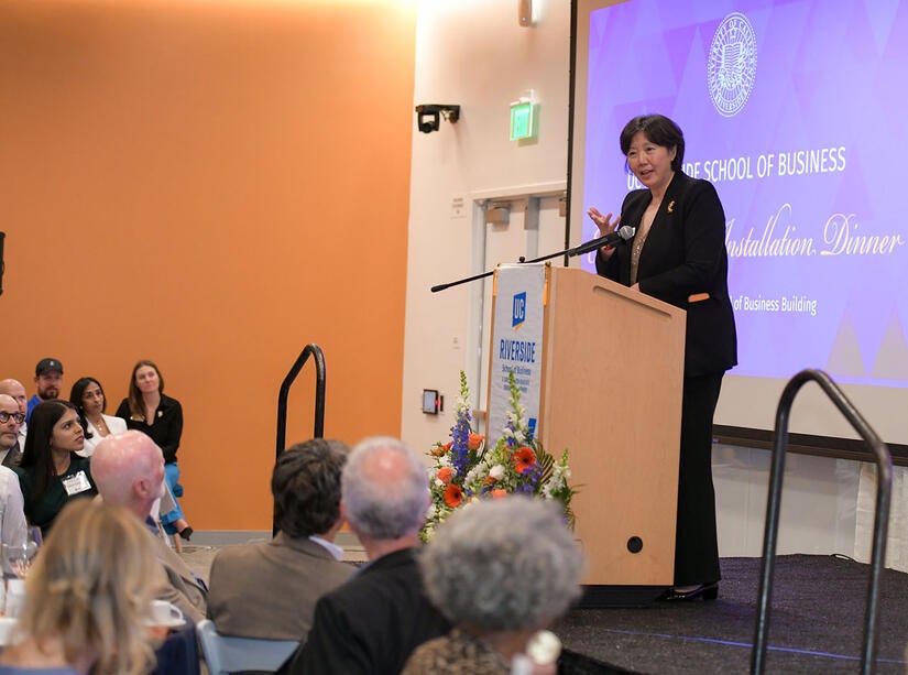 Ching Liu giving a speech at the Executive Fellows dinner.